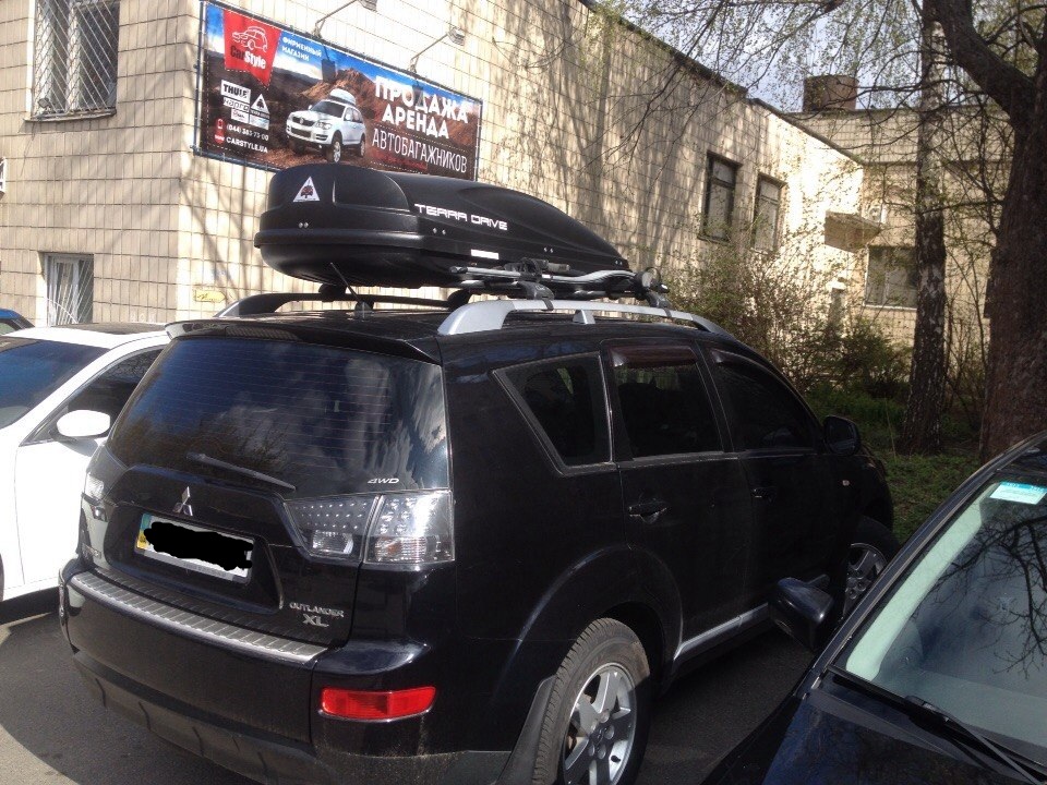 TD-480B + Thule ProRide 591 на Mitsubishi Outlander XL
