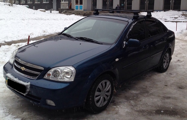 Chevrolet Lacetti Thule-754 SquareBar